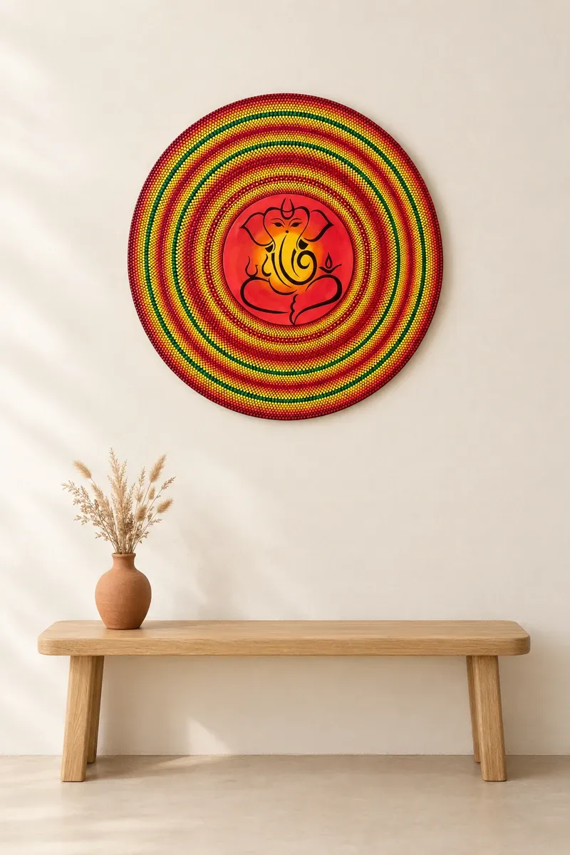 Ganesha in Rings of Light hanging on a plain wall above a wooden bench