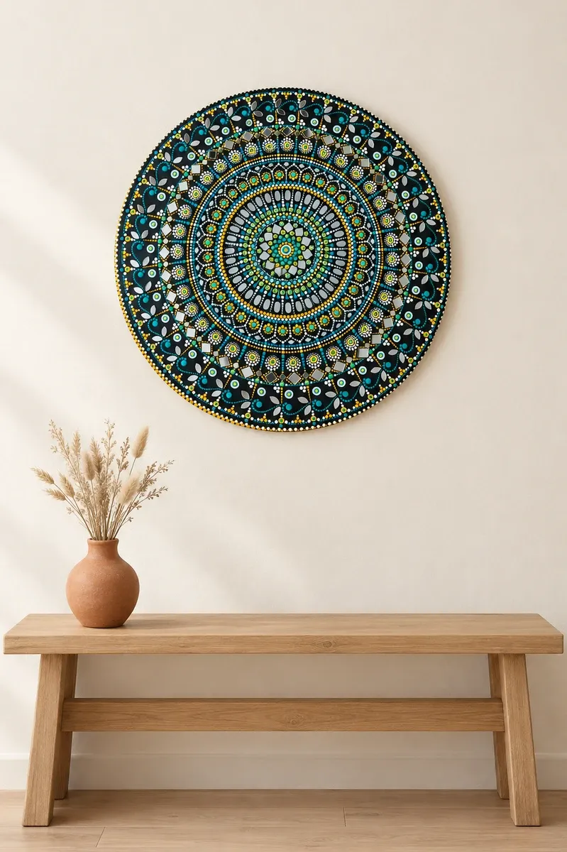 Shisha Rangoli, 24 inches, hanging above a wooden bench